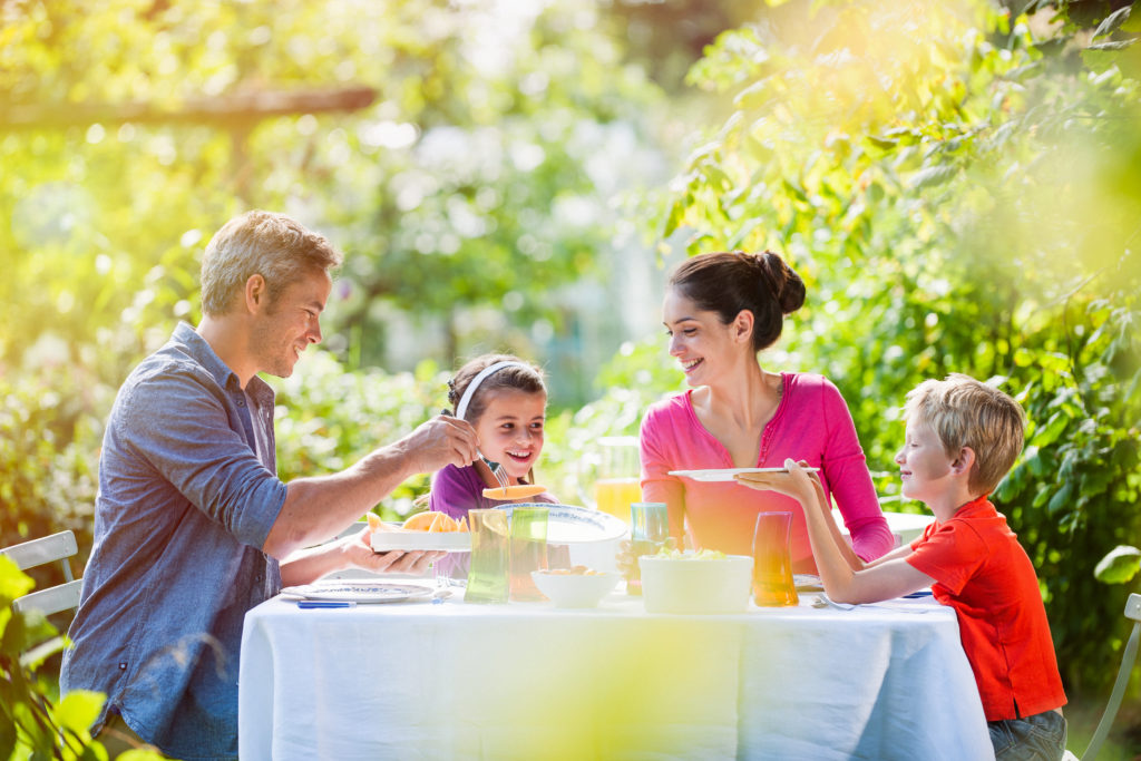 Family eating in the garden